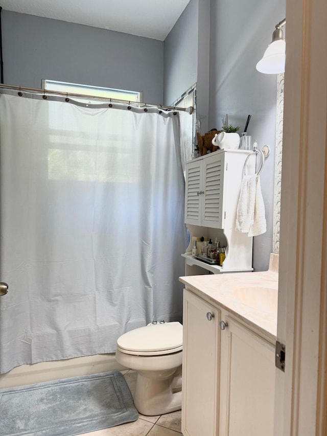 full bathroom featuring vanity, toilet, shower / bath combo, and tile patterned floors