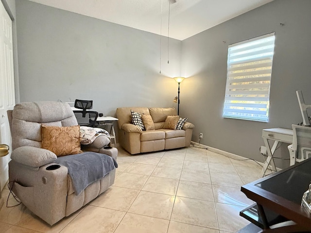 living area featuring light tile patterned floors