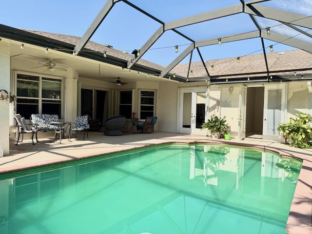 outdoor pool featuring ceiling fan, a patio, and an outdoor hangout area