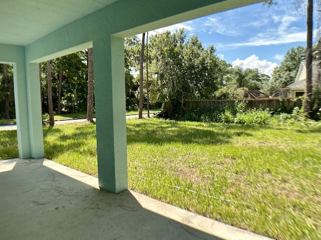 view of yard with a patio area and fence