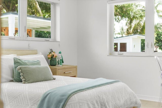 6100 La Gorce Dr, Miami Beach, FL 33140 - bedroom featuring baseboards