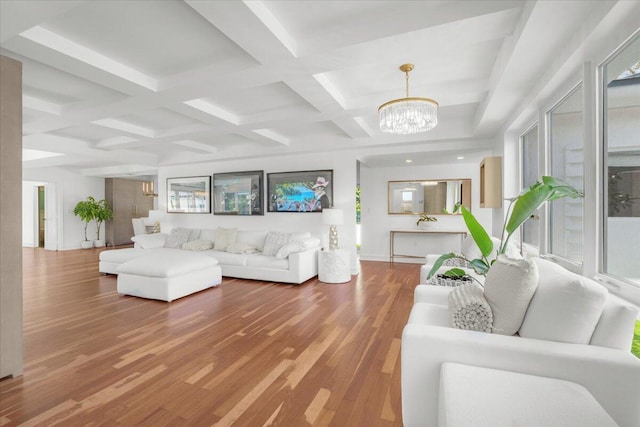 6100 La Gorce Dr, Miami Beach, FL 33140 - living area featuring a chandelier, plenty of natural light, coffered ceiling, wood finished floors, and beam ceiling