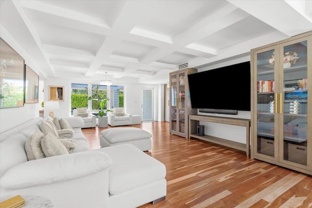 6100 La Gorce Dr, Miami Beach, FL 33140 - living room with light wood finished floors, coffered ceiling, and beamed ceiling