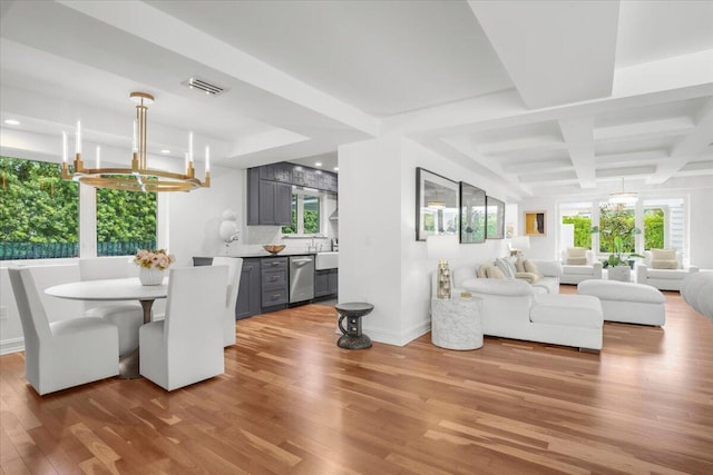 6100 La Gorce Dr, Miami Beach, FL 33140 - dining room with wood finished floors, a chandelier, coffered ceiling, baseboards, and beamed ceiling