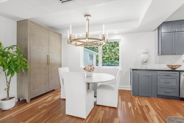 6100 La Gorce Dr, Miami Beach, FL 33140 - dining room featuring a chandelier, light wood-style flooring, and recessed lighting
