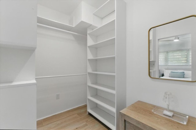 6100 La Gorce Dr, Miami Beach, FL 33140 - walk in closet with wood finished floors and ceiling fan