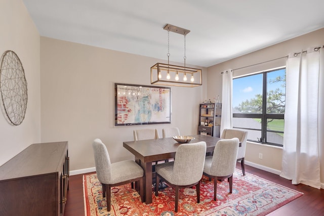 730 Greensward Ct Unit 203J, Delray Beach, FL 33445 - dining space featuring dark wood-style flooring and baseboards
