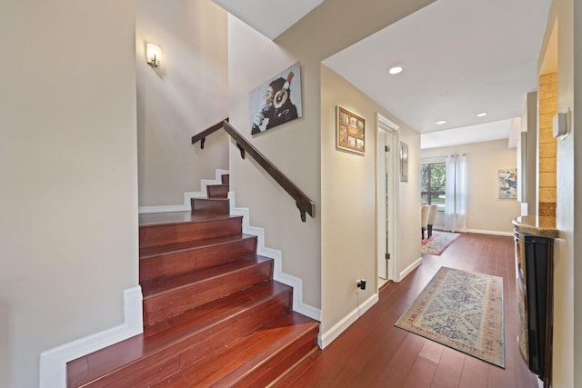 730 Greensward Ct Unit 203J, Delray Beach, FL 33445 - stairs featuring hardwood / wood-style floors, baseboards, and recessed lighting