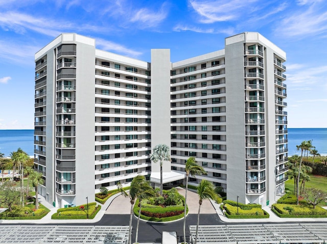 view of building exterior featuring a water view