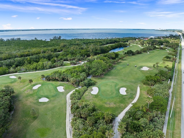 aerial view with a water view and golf course view