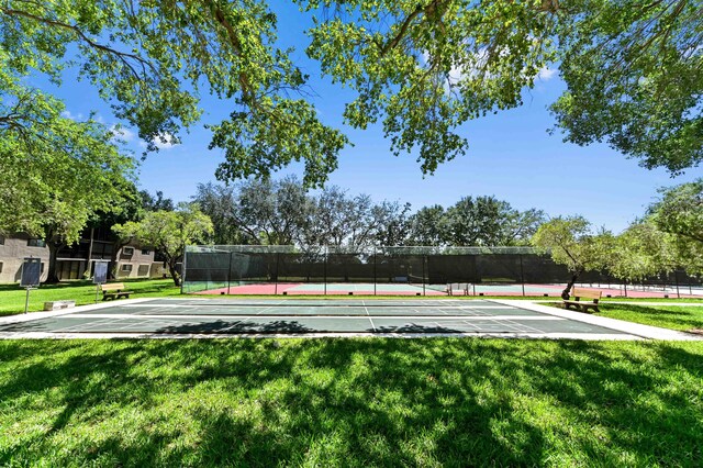 15244 Lakes Of Delray Blvd Unit 203, Delray Beach, FL 33484 - view of yard featuring a tennis court and shuffleboard