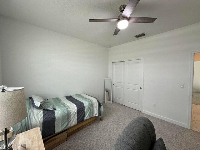 10230 SW Orana Dr, Port Saint Lucie, FL 34987 - bedroom featuring carpet, baseboards, and ceiling fan