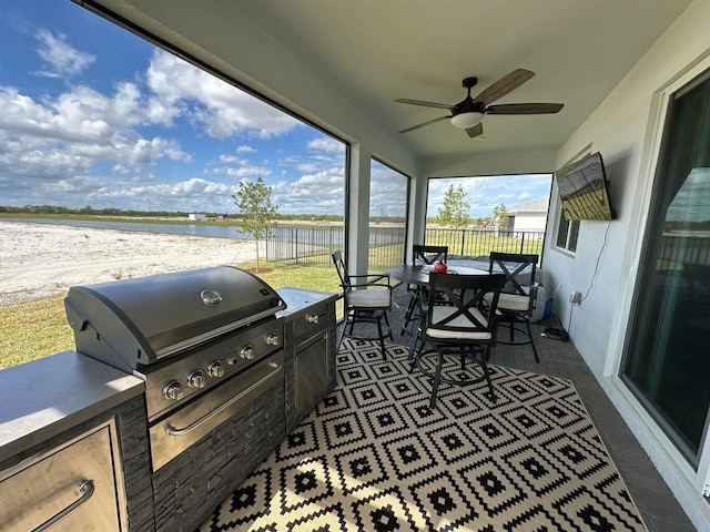 10230 SW Orana Dr, Port Saint Lucie, FL 34987 - view of patio / terrace featuring outdoor dining space, area for grilling, fence, and ceiling fan