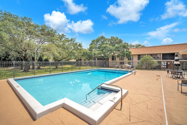 5821 Washington St Unit 21, Hollywood, FL 33023 - community pool with a patio area