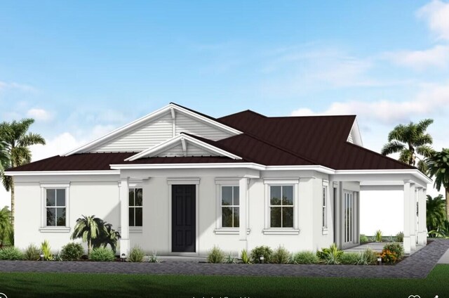 19789 SE Turnbridge Dr Unit Monticello 80, Jupiter, FL 33458 - view of front of house featuring a standing seam roof, metal roof, and stucco siding