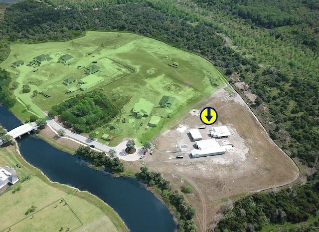 19789 SE Turnbridge Dr Unit Monticello 80, Jupiter, FL 33458 - aerial view of property and surrounding area featuring a large body of water and a forest