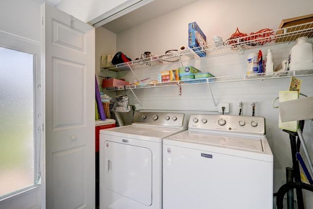 laundry area with washing machine and dryer and laundry area