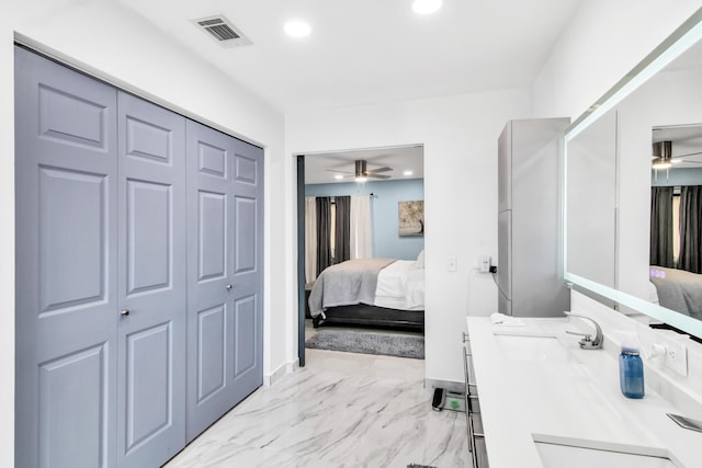 bathroom featuring ensuite bath, a ceiling fan, and recessed lighting