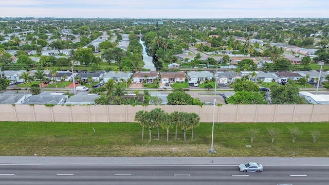 aerial overview of property's location with nearby suburban area