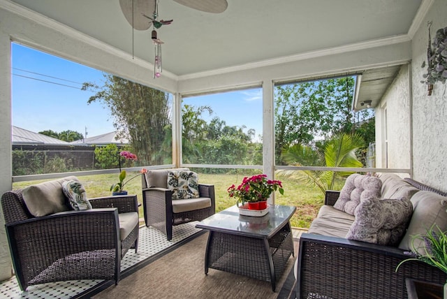 sunroom / solarium featuring an outdoor hangout area, a ceiling fan, and healthy amount of natural light