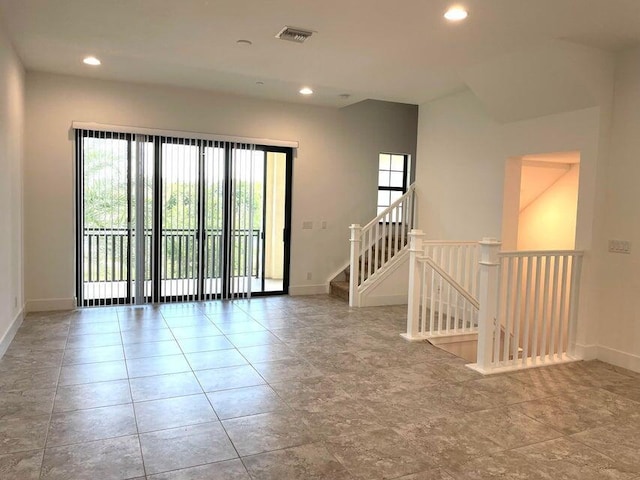 12913 Alton Rd, Palm Beach Gardens, FL 33418 - spare room with baseboards and recessed lighting