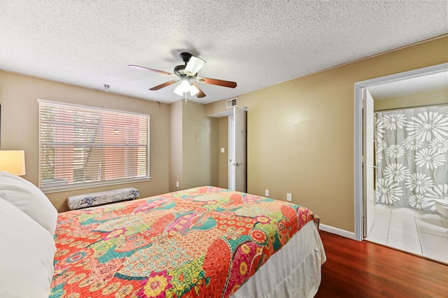 1125 Crystal Way Unit I, Delray Beach, FL 33444 - bedroom with wood finished floors, baseboards, a textured ceiling, and ceiling fan