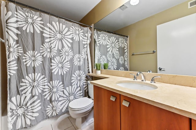 1125 Crystal Way Unit I, Delray Beach, FL 33444 - full bath featuring toilet, vanity, tile patterned flooring, and a shower with shower curtain