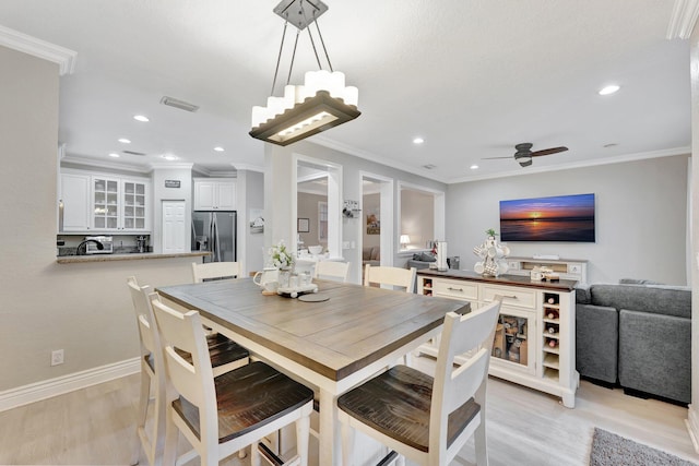 5742 NW 119th Ter, Coral Springs, FL 33076 - dining space with ornamental molding, visible vents, recessed lighting, light wood finished floors, and ceiling fan