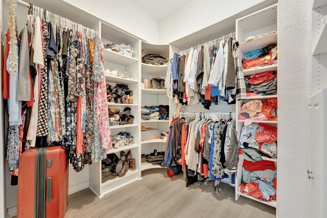 5742 NW 119th Ter, Coral Springs, FL 33076 - spacious closet featuring wood finished floors