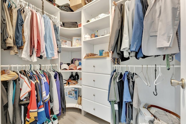 5742 NW 119th Ter, Coral Springs, FL 33076 - walk in closet featuring wood finished floors
