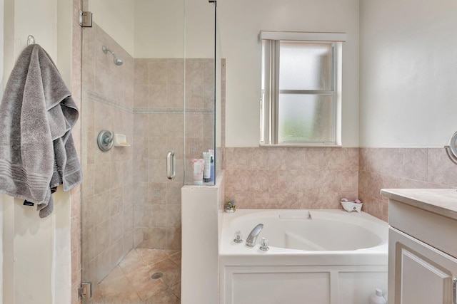 5742 NW 119th Ter, Coral Springs, FL 33076 - full bathroom featuring vanity, a garden tub, and a shower stall