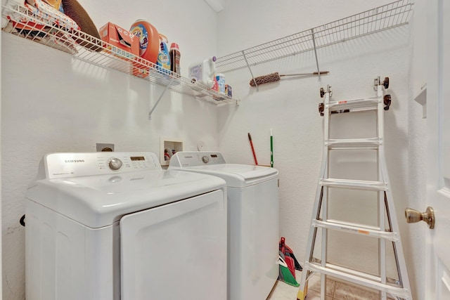 5742 NW 119th Ter, Coral Springs, FL 33076 - laundry room with laundry area and washer and clothes dryer