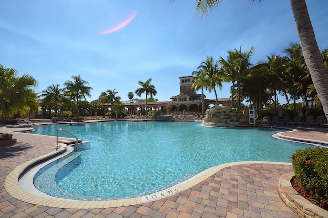 5742 NW 119th Ter, Coral Springs, FL 33076 - community pool featuring a patio area