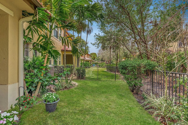 5742 NW 119th Ter, Coral Springs, FL 33076 - view of yard featuring a fenced backyard