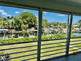 entryway featuring a water view