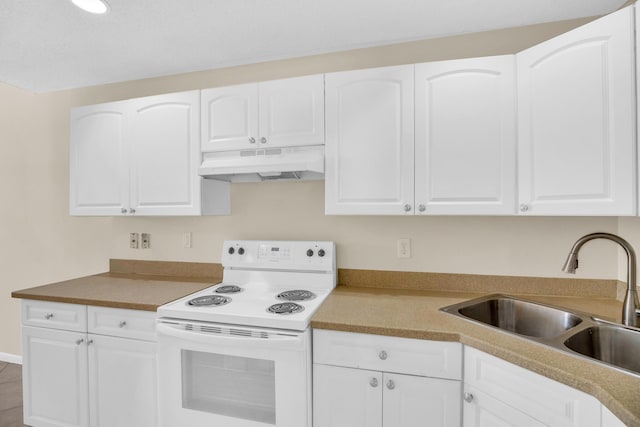 2015 Oleander Blvd Unit A, Fort Pierce, FL 34950 - kitchen featuring under cabinet range hood, white range with electric cooktop, a sink, and white cabinetry