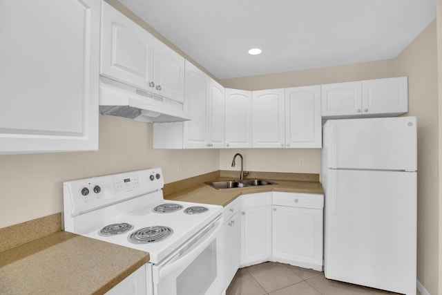 2015 Oleander Blvd Unit A, Fort Pierce, FL 34950 - kitchen featuring white appliances, under cabinet range hood, a sink, white cabinetry, and recessed lighting