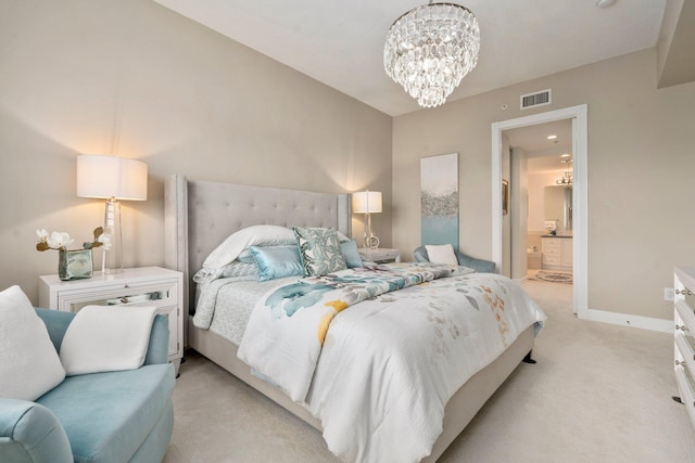 bedroom with ensuite bathroom, visible vents, an inviting chandelier, light carpet, and baseboards