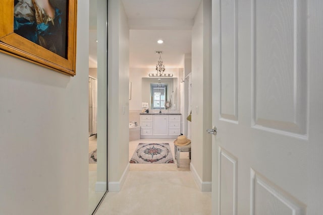 hallway with recessed lighting