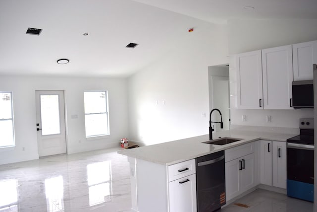 15722 NW 270th St, Okeechobee, FL 34972 - kitchen with a sink, electric range, dishwasher, a peninsula, and white cabinetry