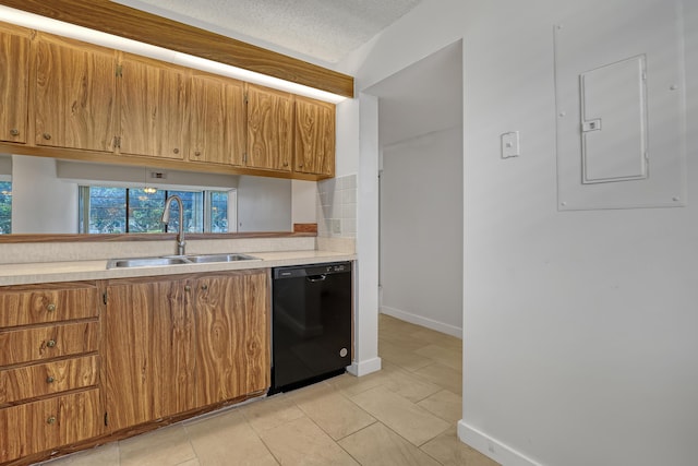 kitchen with a sink, electric panel, dishwasher, light countertops, and baseboards