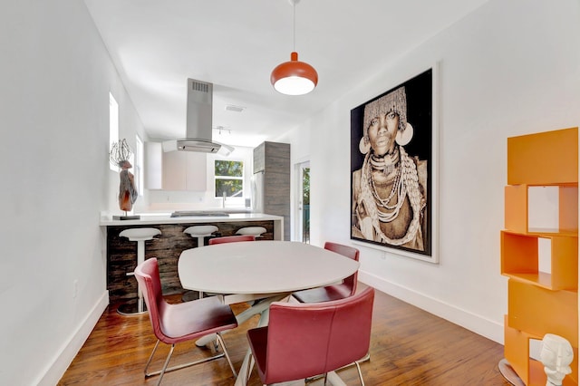 430 NE 121st St, Biscayne Park, FL 33161 - dining area with wood finished floors and baseboards