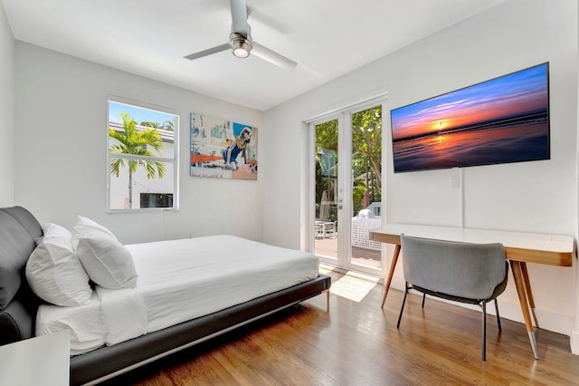 430 NE 121st St, Biscayne Park, FL 33161 - bedroom featuring a ceiling fan, access to outside, and wood finished floors