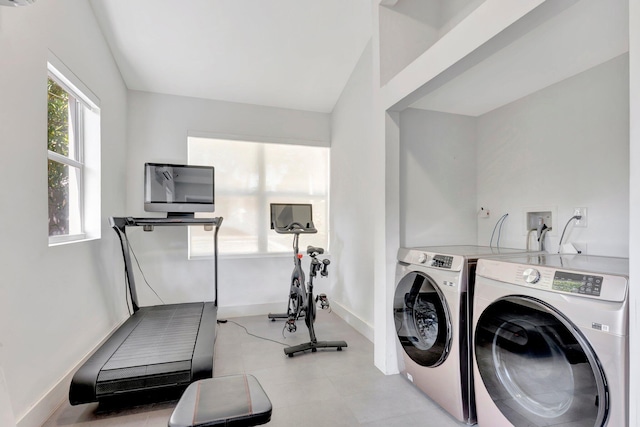 430 NE 121st St, Biscayne Park, FL 33161 - laundry area featuring washing machine and clothes dryer, baseboards, and laundry area
