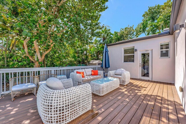 430 NE 121st St, Biscayne Park, FL 33161 - wooden terrace featuring an outdoor living space