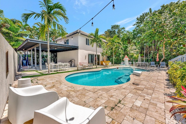 430 NE 121st St, Biscayne Park, FL 33161 - pool with an outdoor living space, a patio, outdoor dining area, and a fenced backyard