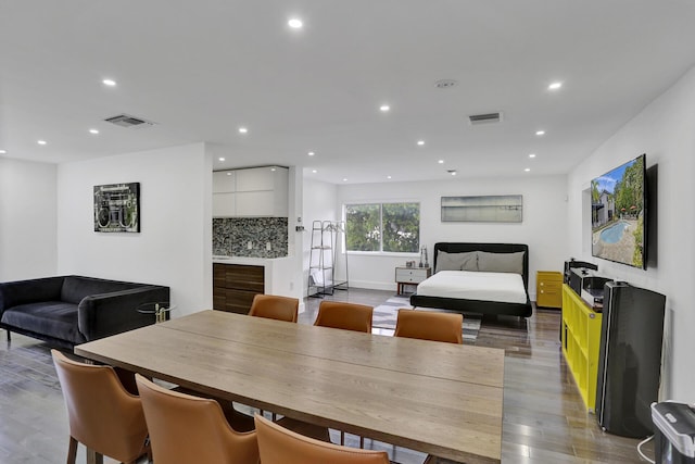 430 NE 121st St, Biscayne Park, FL 33161 - dining room featuring recessed lighting, baseboards, visible vents, and wood finished floors