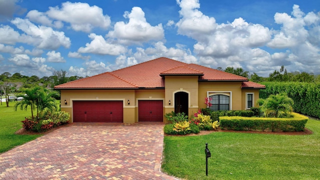 964 SW Canoe Creek Ter, Palm City, FL 34990 - mediterranean / spanish-style home with a garage, stucco siding, a tile roof, a front lawn, and decorative driveway
