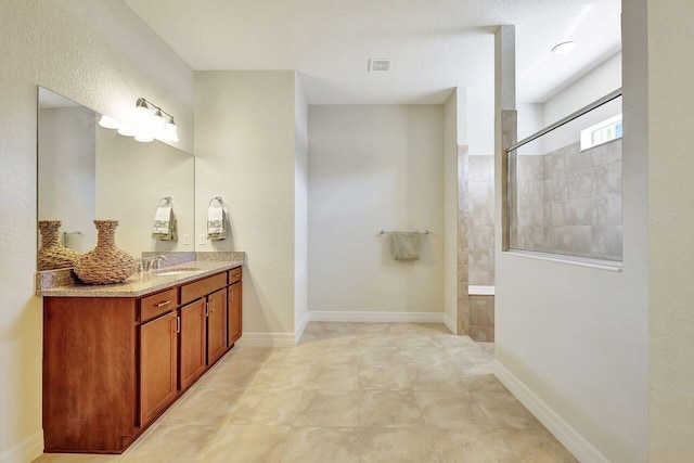 964 SW Canoe Creek Ter, Palm City, FL 34990 - bathroom with visible vents, vanity, and a walk in shower