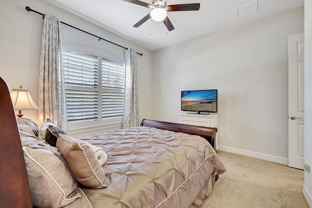 964 SW Canoe Creek Ter, Palm City, FL 34990 - bedroom with baseboards, ceiling fan, and carpet floors